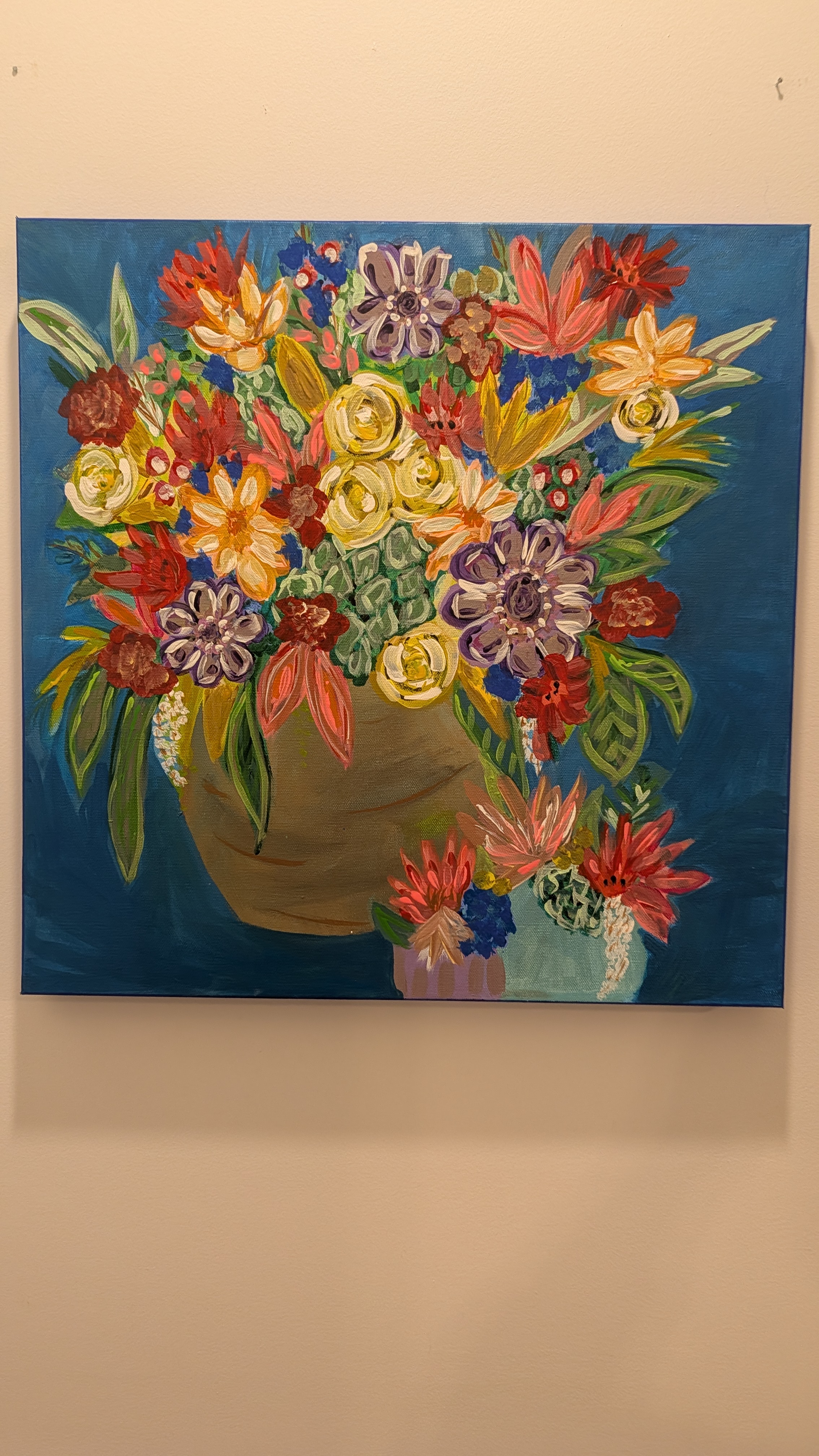 Emmy Brooks painting in her studio